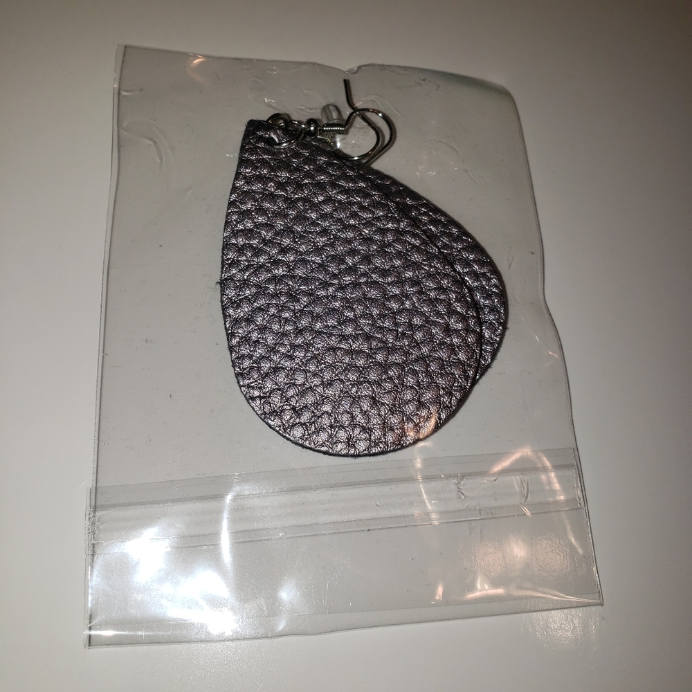 Silver Faux leather earrings New in pack